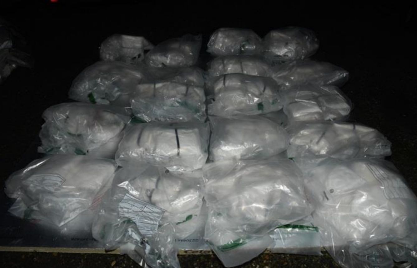 Numerous bags of drugs piled up