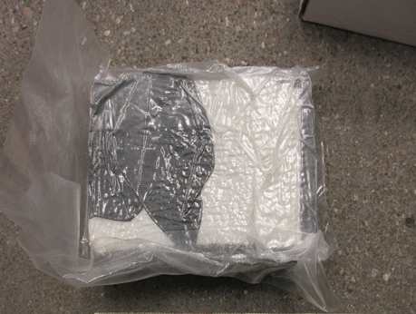 A bag of cocaine on the floor