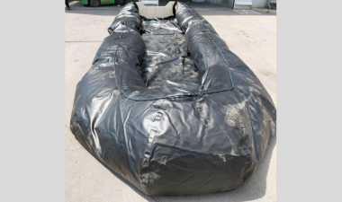Boat laid out on ground outside