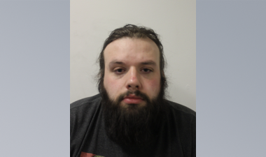 Image of Matthew Slate - white male with brown hair and a beard in a dark top